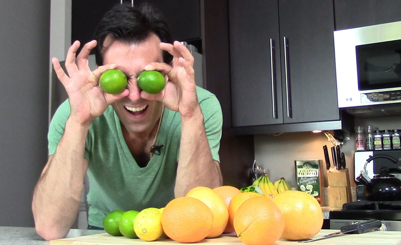 Lenny Gale limes on his eyes demonstrating how to slice citrus fruits.