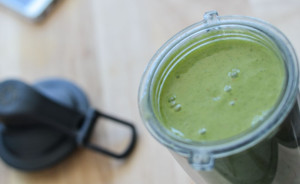 Green smoothie in to-go cup.