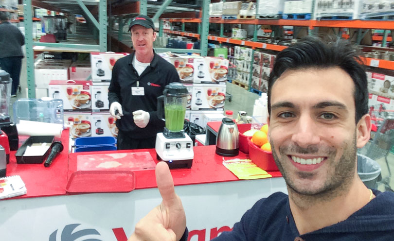 Lenny Gale posing in with a Vitamix demonstration at Costco.