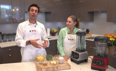 Lenny Gale learns the technique for making green smoothies in a Vitamix.