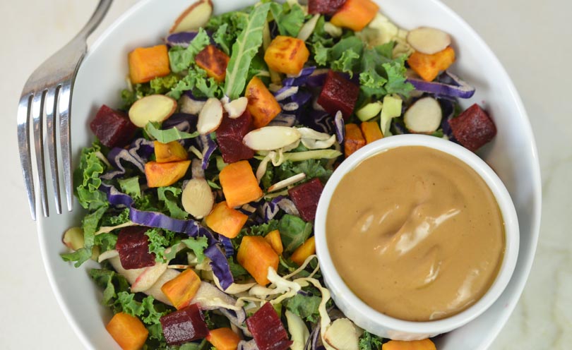 Balsamic Vinaigrette dressing on colorful salad featured by Life is NOYOKE.