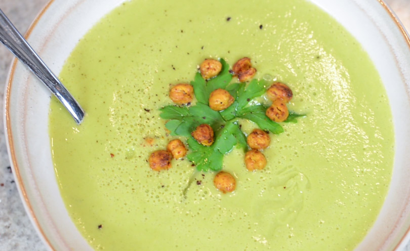 Zucchini coconut soup served with roasted chickpeas.