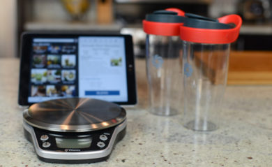 Vitamix Perfect Blend Scale and Interactive Recipe App with ipad and two smoothie cups.