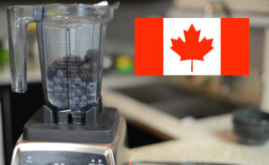 Photograph of Vitamix Pro 750 with Canadaian flag image in foreground.