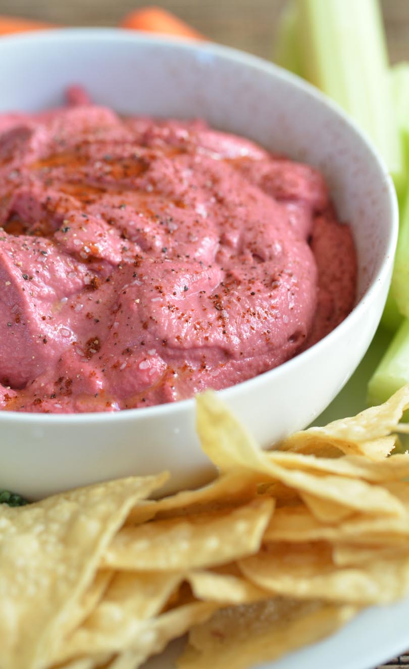 A big bowl of bright red beet hummus made in our Vitamix.