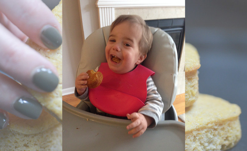 Baby Avi in his highchair enjoying some of Life is NOYOKE's cornbread.