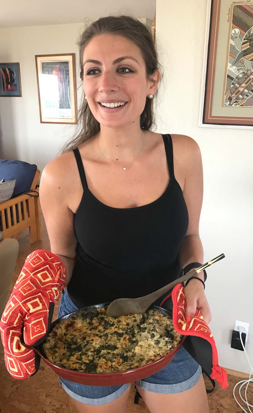 Shalva serving her artichoke dip
