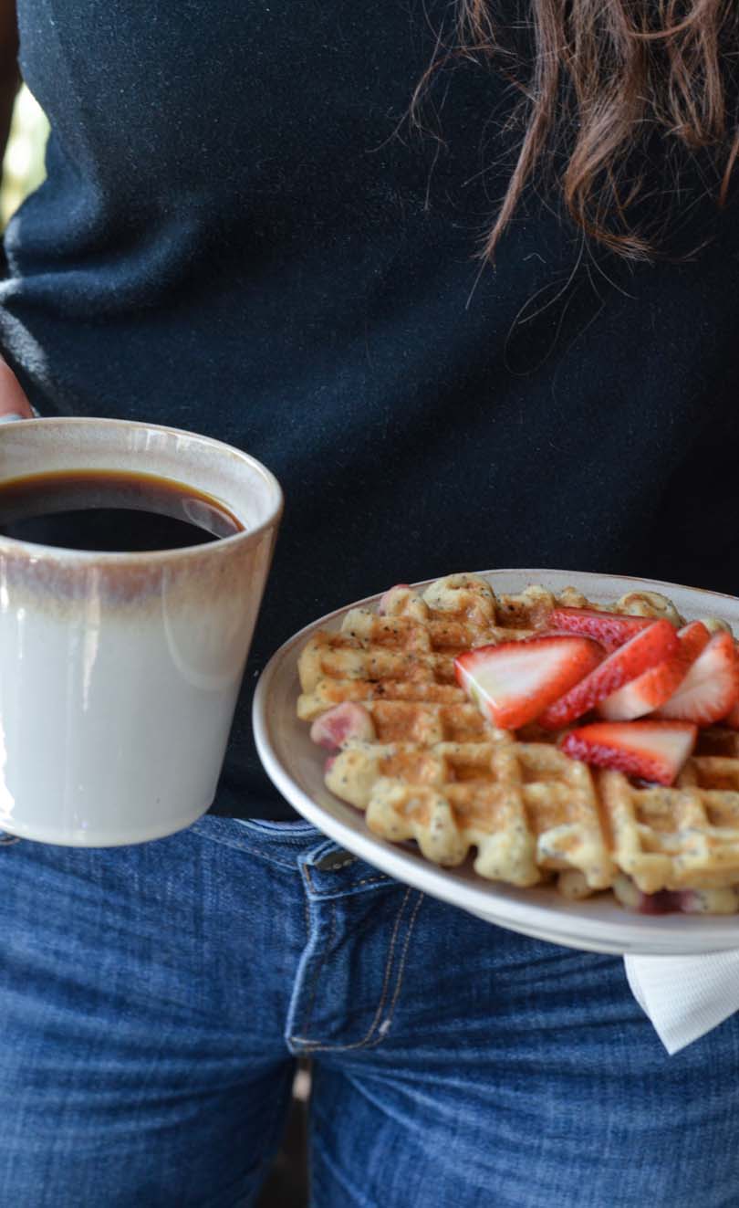 Waffles served with coffee.