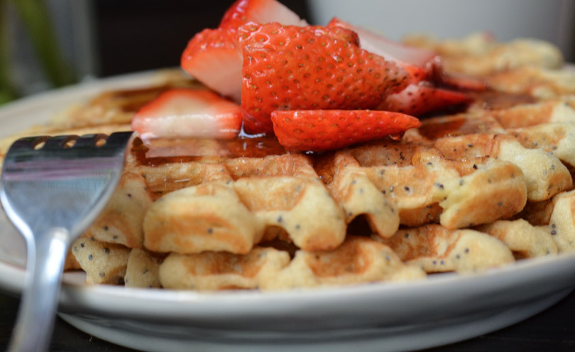 Waffles with strawberries on top by Life is NOYOKE.