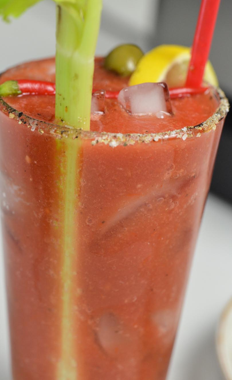 Homemade bloody mary mix with celery.