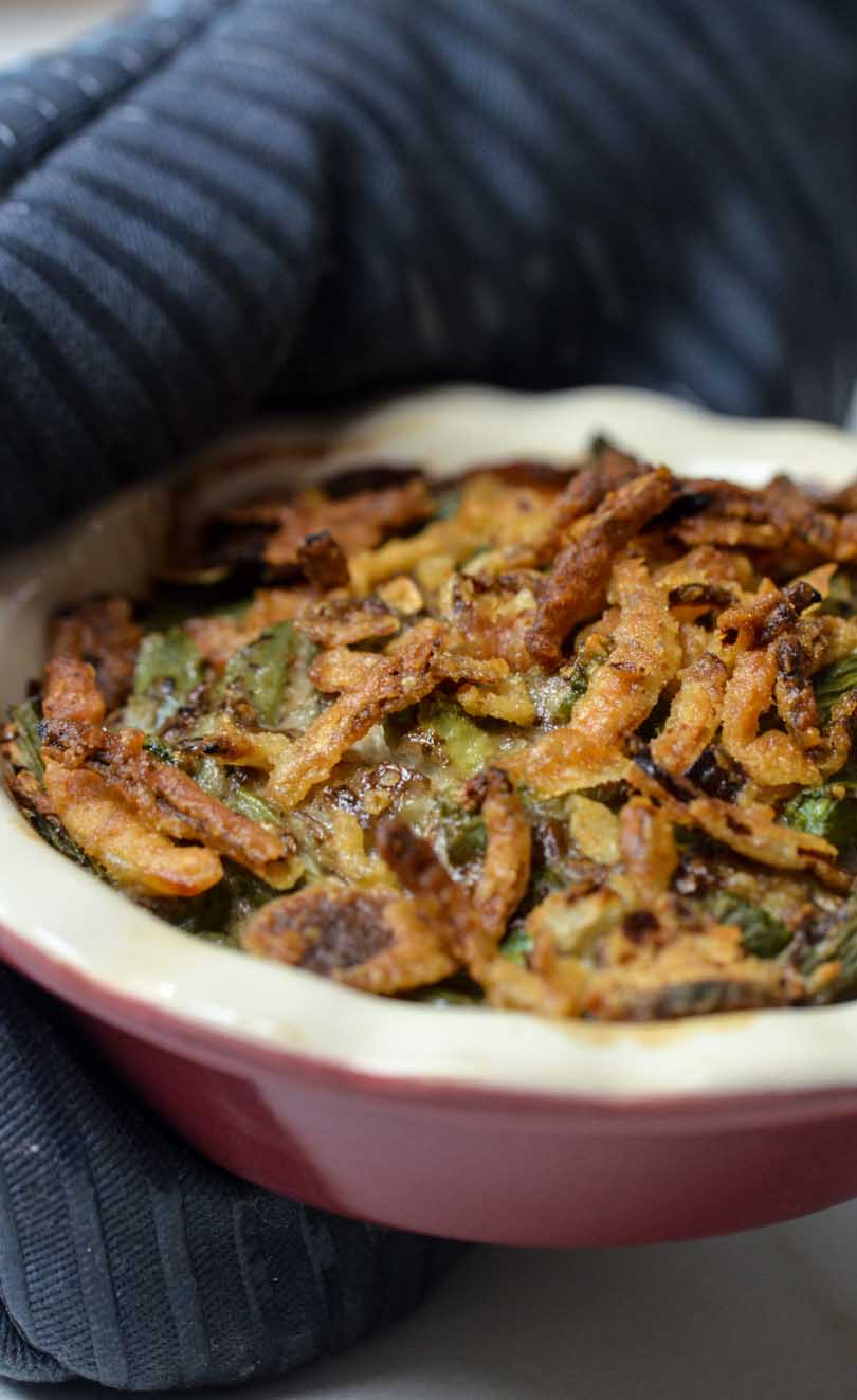 Green bean casserole served with hot mitts.