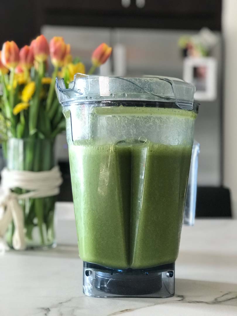 Green juice blended in a Vitamix.