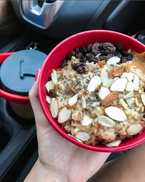 loaded oatmeal bowl in car for road trip